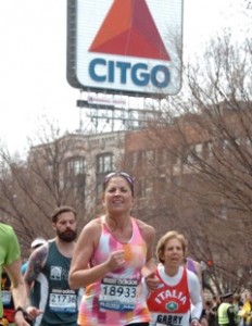 Booher running toward the finishing line