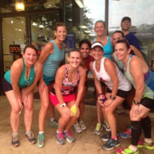 Alix Shutello, (second from left) with her Tuesday running team and Moms Run This Town